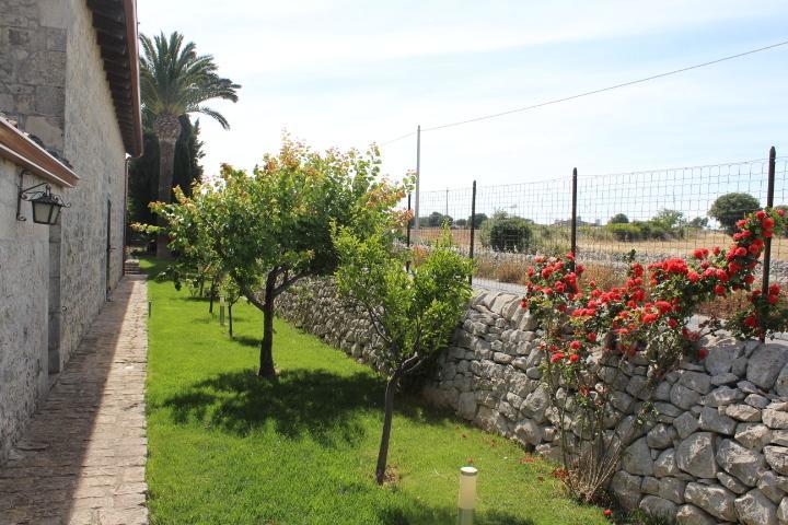 Appartamento Le Tre Palme Frigintini Oda fotoğraf